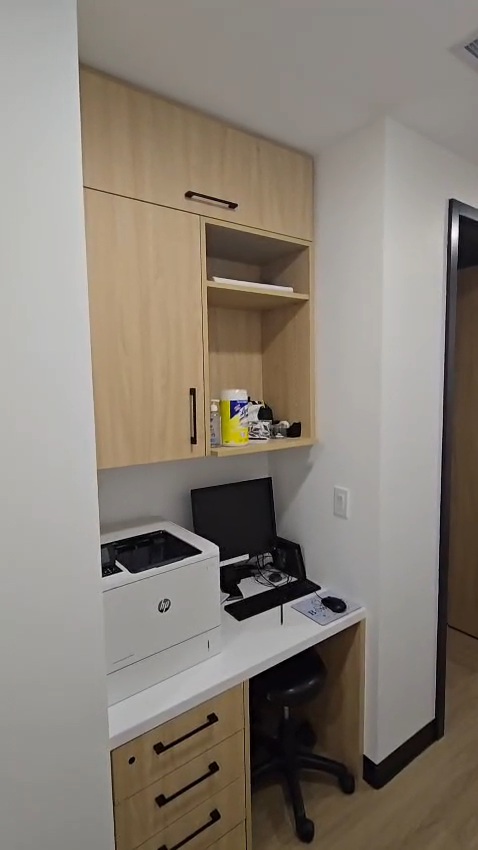Bow Care Clinic admin nook with built-in desk and monitor