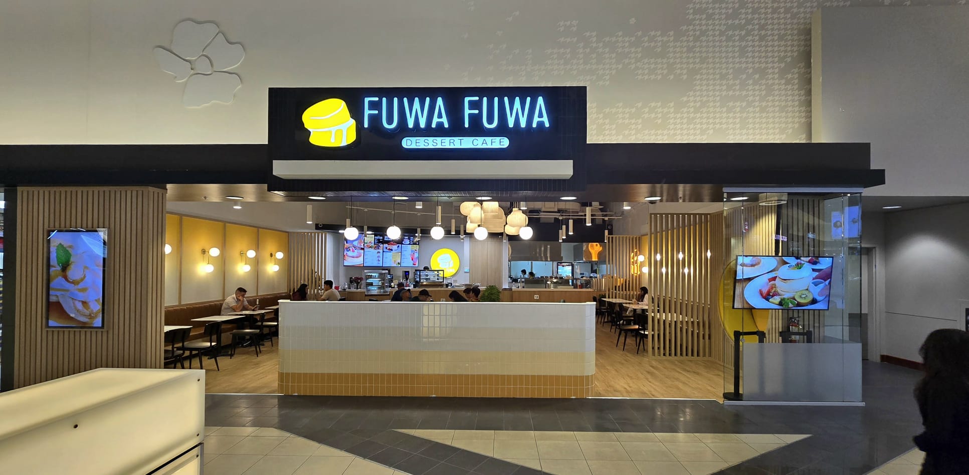 Fuwa Fuwa exterior storefront with illuminated dessert café signage