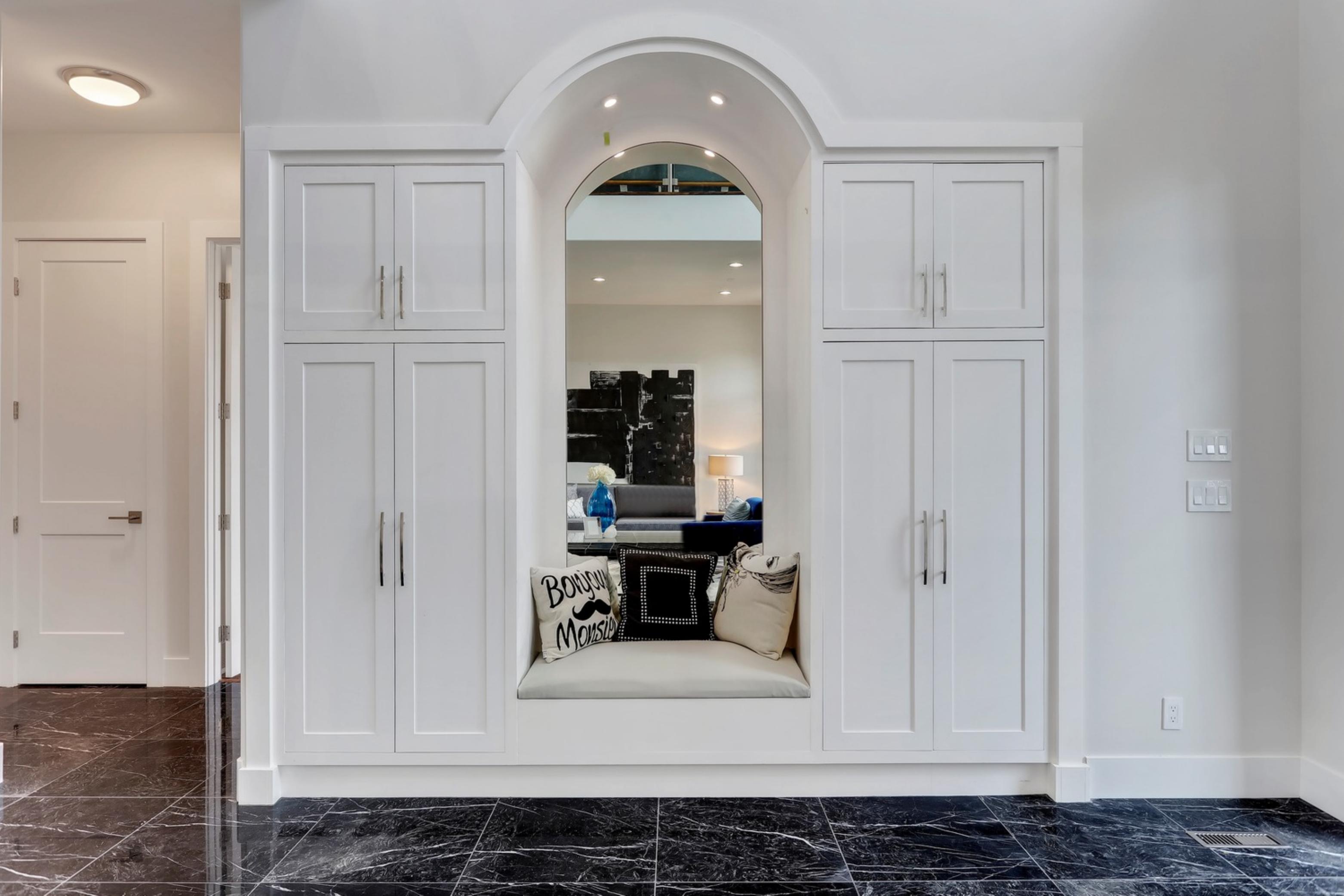 Killanery Custom Residence arched built-in reading nook with mirror and bench seat