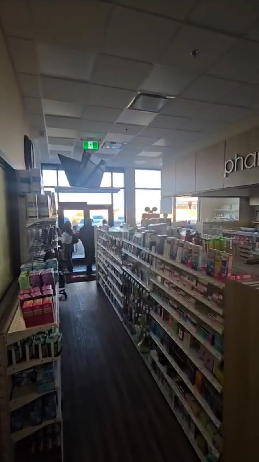 Pharmasave prescription counter and pick-up stations